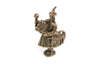 Urocza stojąca figurka Lajkonika, wykonana z metalu nieszlachetnego w kolorze starego złota