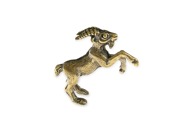 Metalowa, pokryta kolorem postarzonego złota figurka przedstawiająca Zodiakalnego Koziorożca