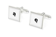 Klasyczne, minimalistyczne w formie spinki mankietowe, wykonane z metalu nieszlachetnego w kolorze srebrnym