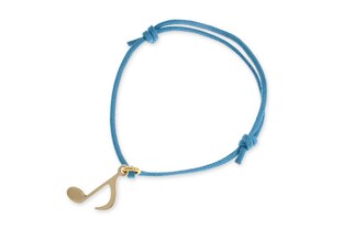 Niebieska bransoletka wykonana ze sznurka woskowanego, na niej umieszczona jest złota przywieszka w kształcie nutki