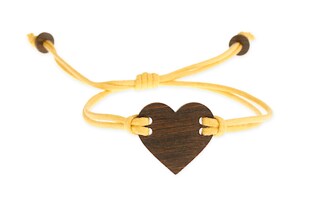 Bransoletka koloru żółtego wykonana ze sznurka woskowanego z przywieszką w kształcie serca