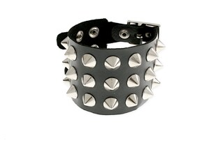 Pieszczocha czarna, skórzana bransoleta z trzema rzędami kolców, wykonanymi z metalu nieszlachetnego w kolorze ciemnego srebra